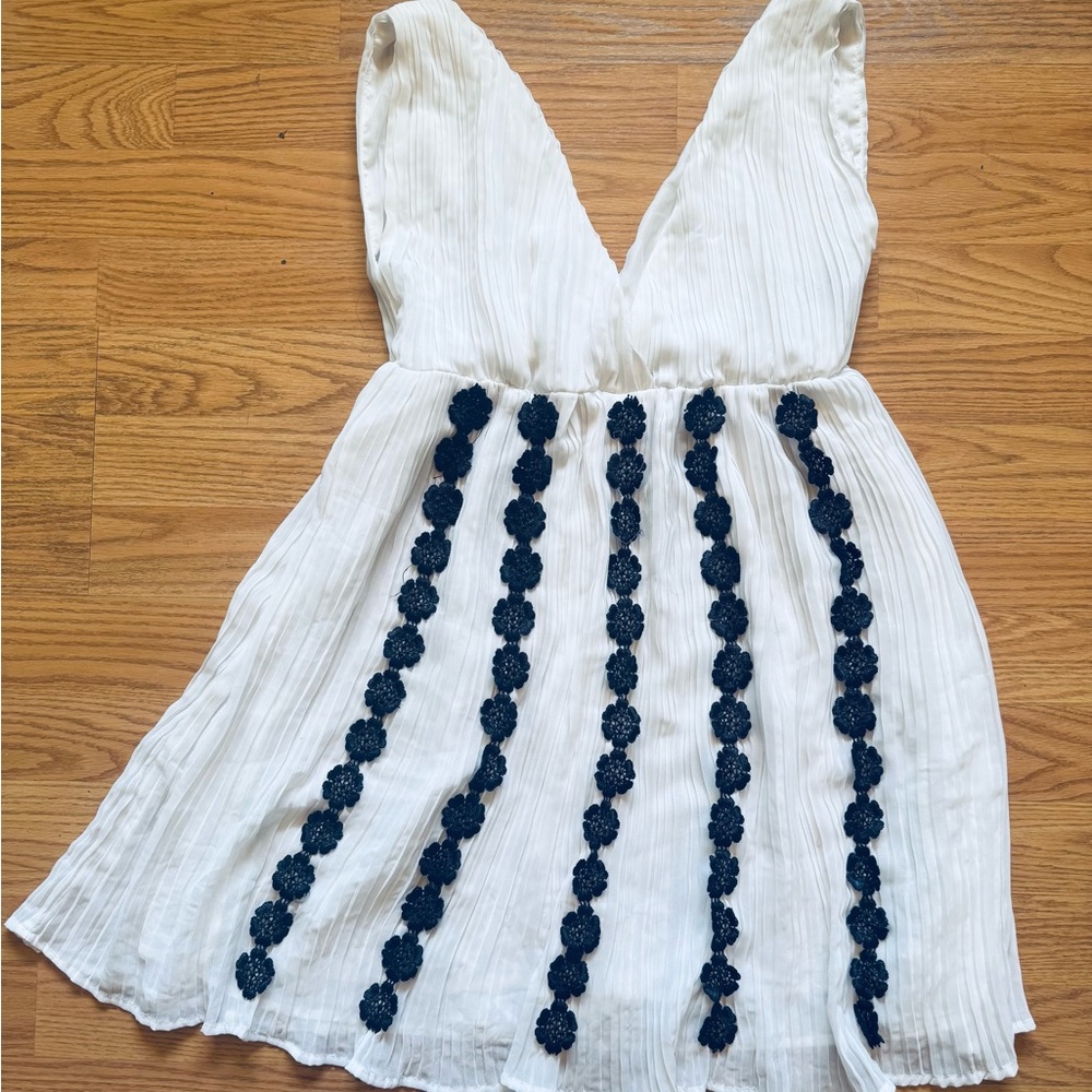 White Dress with Black Floral Accents